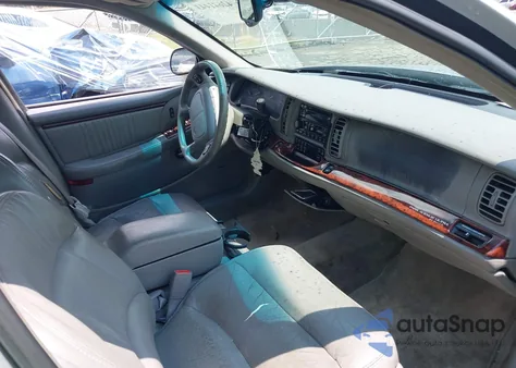 1999 Buick Park Avenue Ultra from USA, damaged, VIN 1G4CU5212X4615667